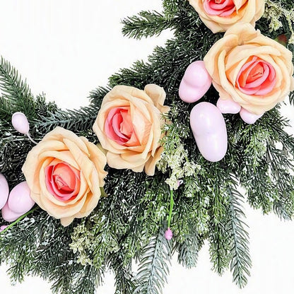 Pink garland; artificial champagne-colored roses