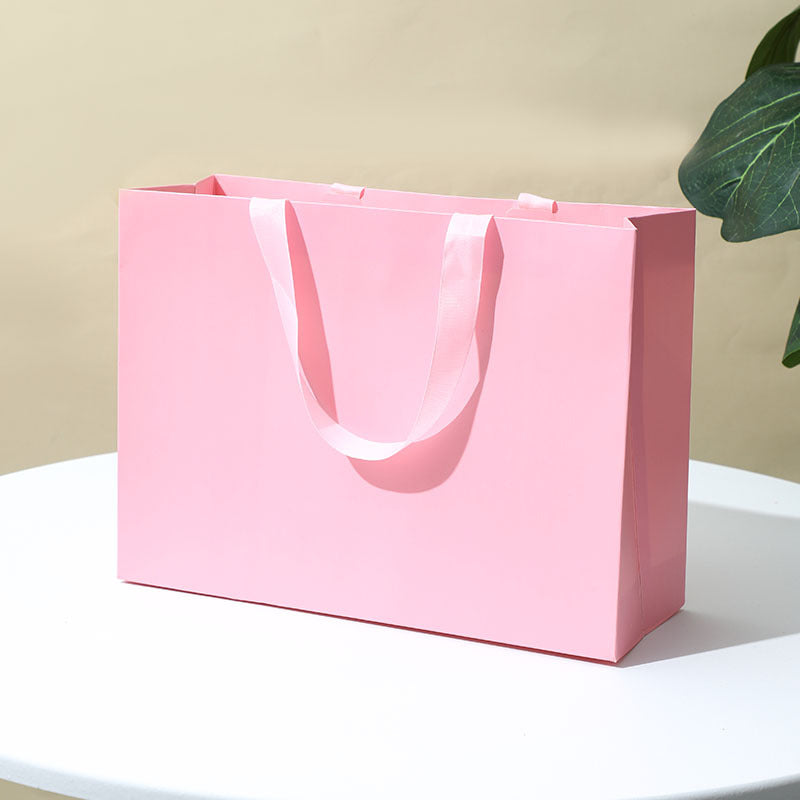 Solid-color gift tote bag¡ªminimalist, premium-feel, made of thickened white cardstock; suitable for jewelry box packaging